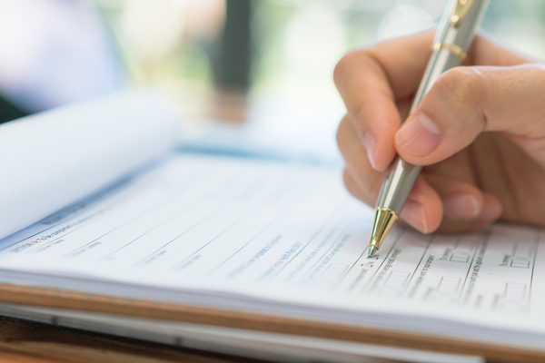 Property Management Staff filling out an Application